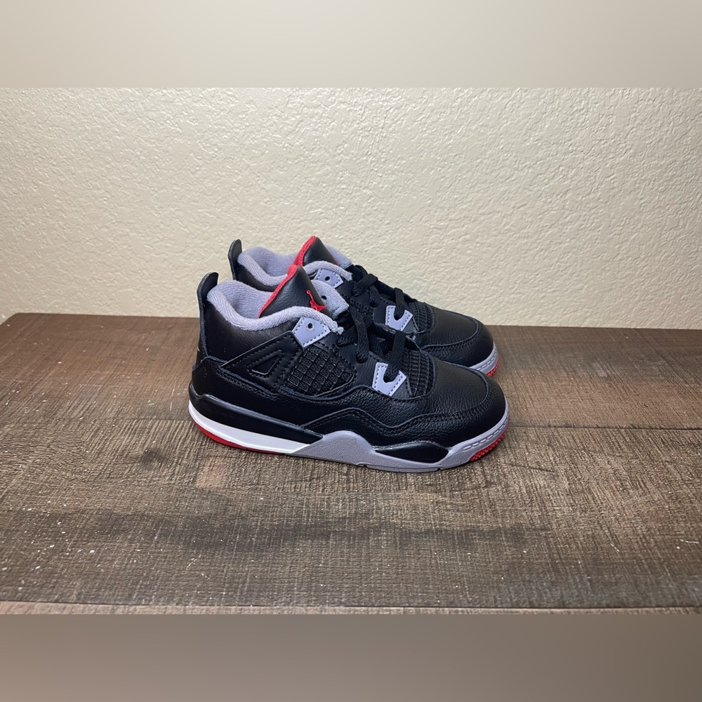 Air Jordan 4 Retro TD “Bred Reimagined” 
- Size 10C.